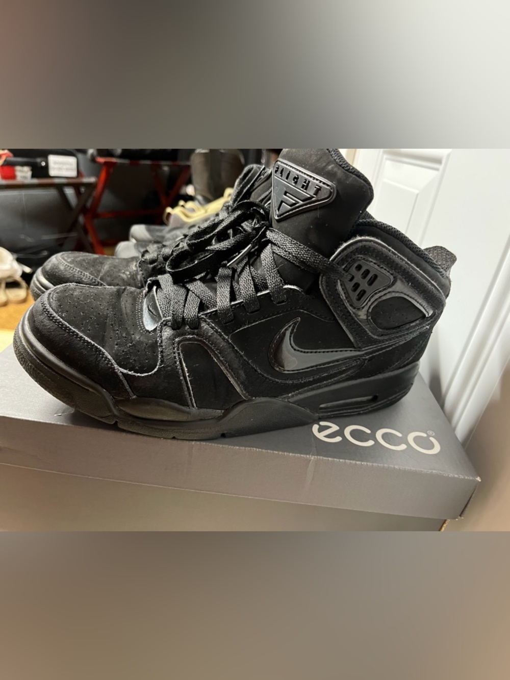 2 pairs of Nike Black Shoes with Blue Trim and Neon Green Insole